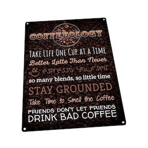 May include: A rectangular metal sign with a coffee bean background and the word "COFFEEOLOGY" at the top. The sign features several coffee-themed phrases in white and brown text, including "TAKE LIFE ONE CUP AT A TIME" and "DRINK BAD COFFEE."