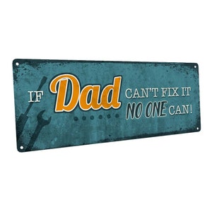 May include: A blue and white metal sign with the text "If Dad can't fix it, no one can!" in a vintage style font. The sign features two tools, a screwdriver and a wrench, in black.