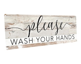 May include: A whitewashed wood sign with black text that reads "Please Wash Your Hands".
