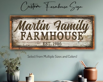 May include: A rustic wooden sign with the text "Martin Family Farmhouse Est. 1986" in brown lettering. The sign has a distressed white background and a brown wooden frame.