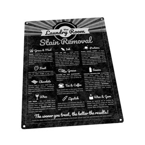 May include: Black and white laundry room stain removal chart with a vintage design. The chart lists common stains and provides instructions for removing them. The chart includes stains such as grass, mud, ink, blood, urine, vomit, fruit, chocolate, grease, sauces, tea, coffee, wine, lipstick, wax, and gum.