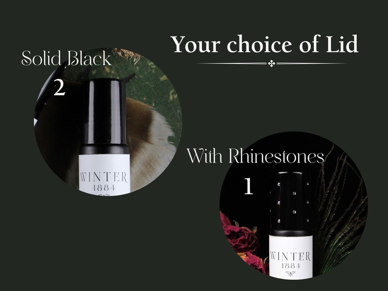 May include: Two black roll-on bottles with the text "WINTER 1884" on the label. The bottle on the left has a solid black lid. The bottle on the right has a lid with rhinestones. The text "Your choice of Lid" is above the bottles. The text "Solid Black" is above the bottle on the left. The text "With Rhinestones" is above the bottle on the right.