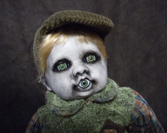 creepy boy doll