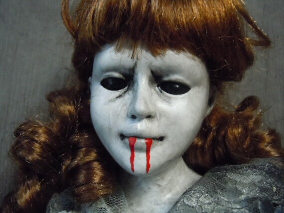 creepy vampire doll