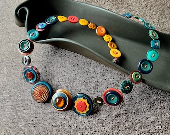 Teal and Orange Button Necklace made with  Bakelite, Dyed Shell and Other Great Buttons; Color Blocked Sides