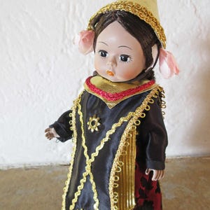Madame Alexander Indonesia Doll: Vintage Costume Doll with Stand