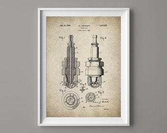 May include: Framed vintage print of a spark plug patent illustration. The print features detailed diagrams of spark plugs, including cross-sectional views and component details. The print is in black and white on a tan background, with text and diagrams.