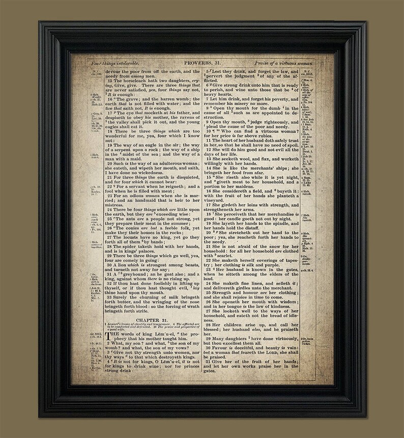 May include: A vintage framed print of a bible passage from Proverbs 31, featuring a black and white text on a cream background. The text describes the qualities of a virtuous woman.