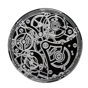 Anodised aluminium engraved &quot;clockwork&quot; patterned coaster