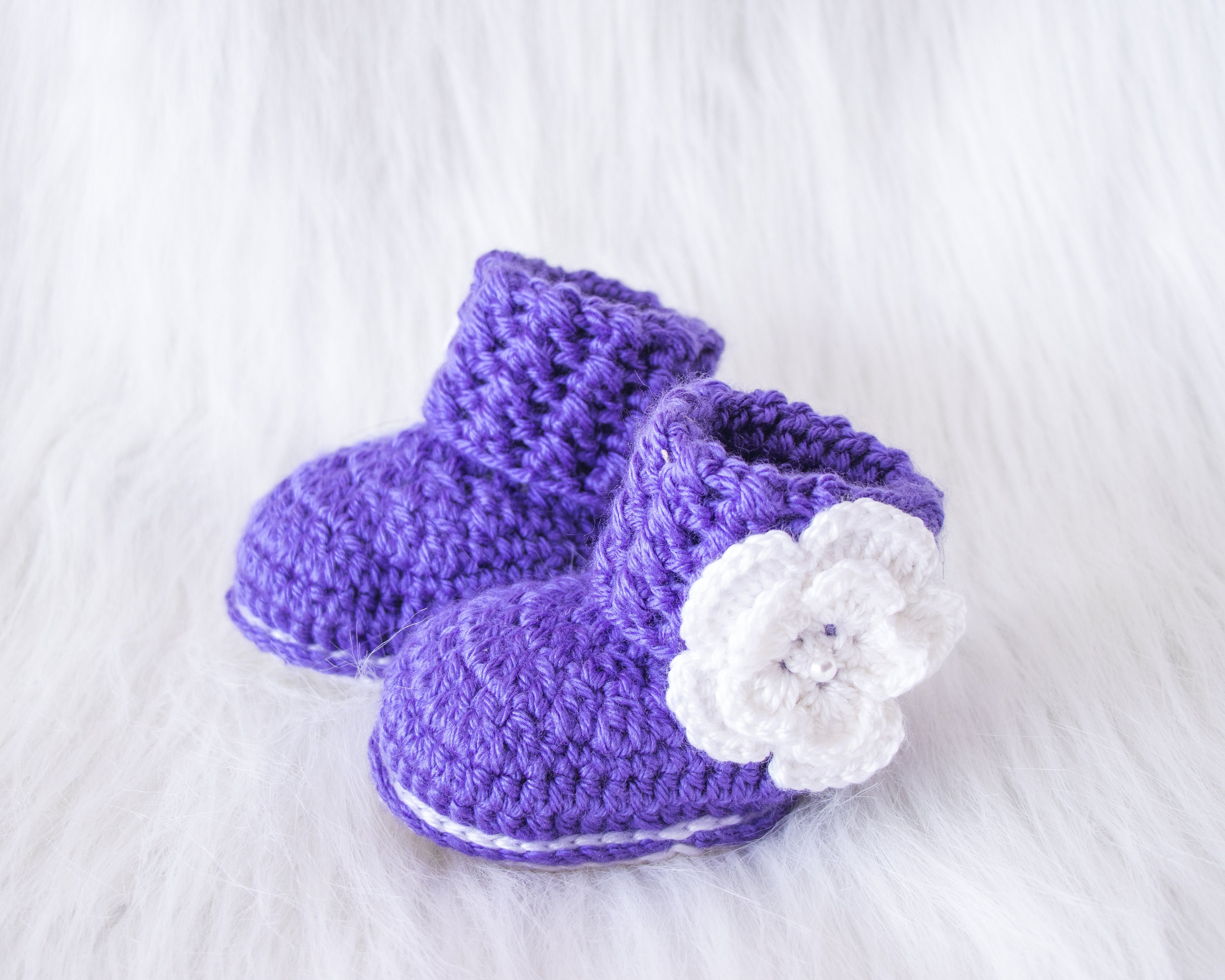 purple baby shoes