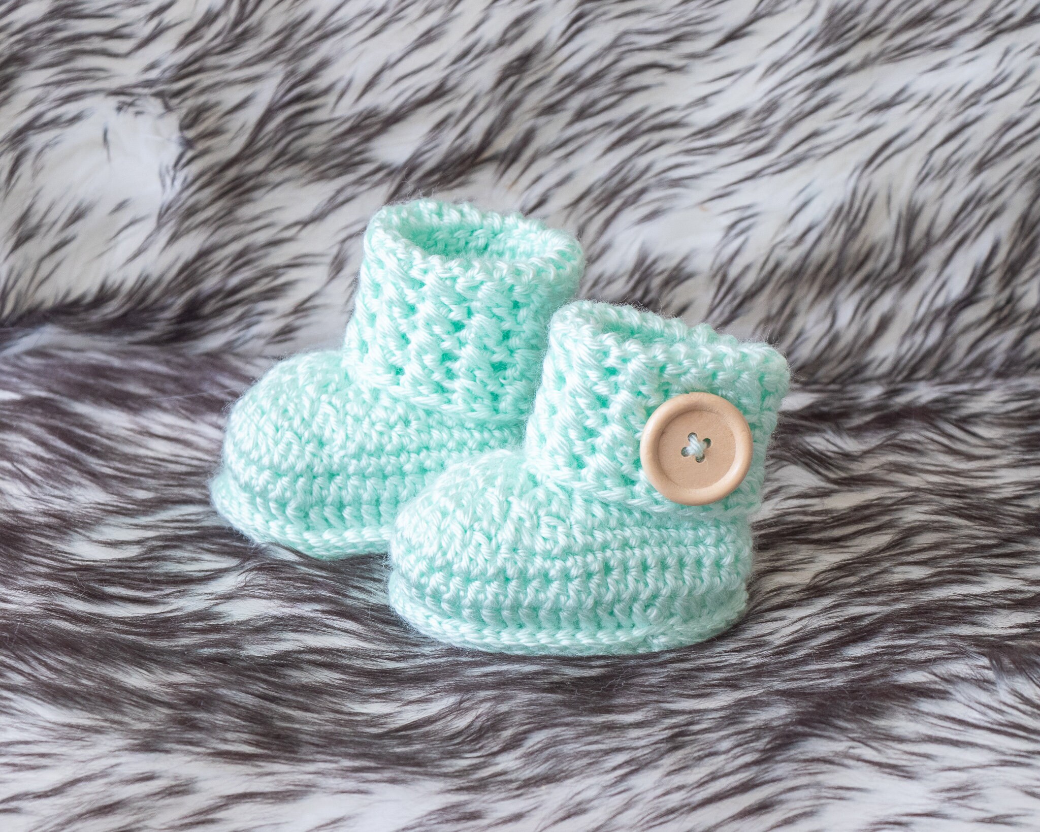 Green hot sale baby booties