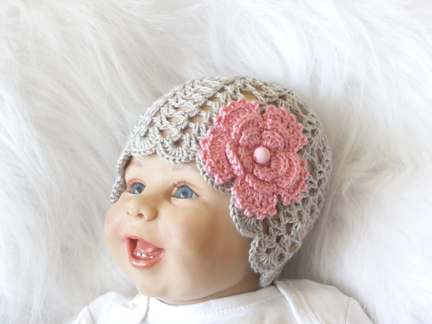 crocheted baby hats with flowers