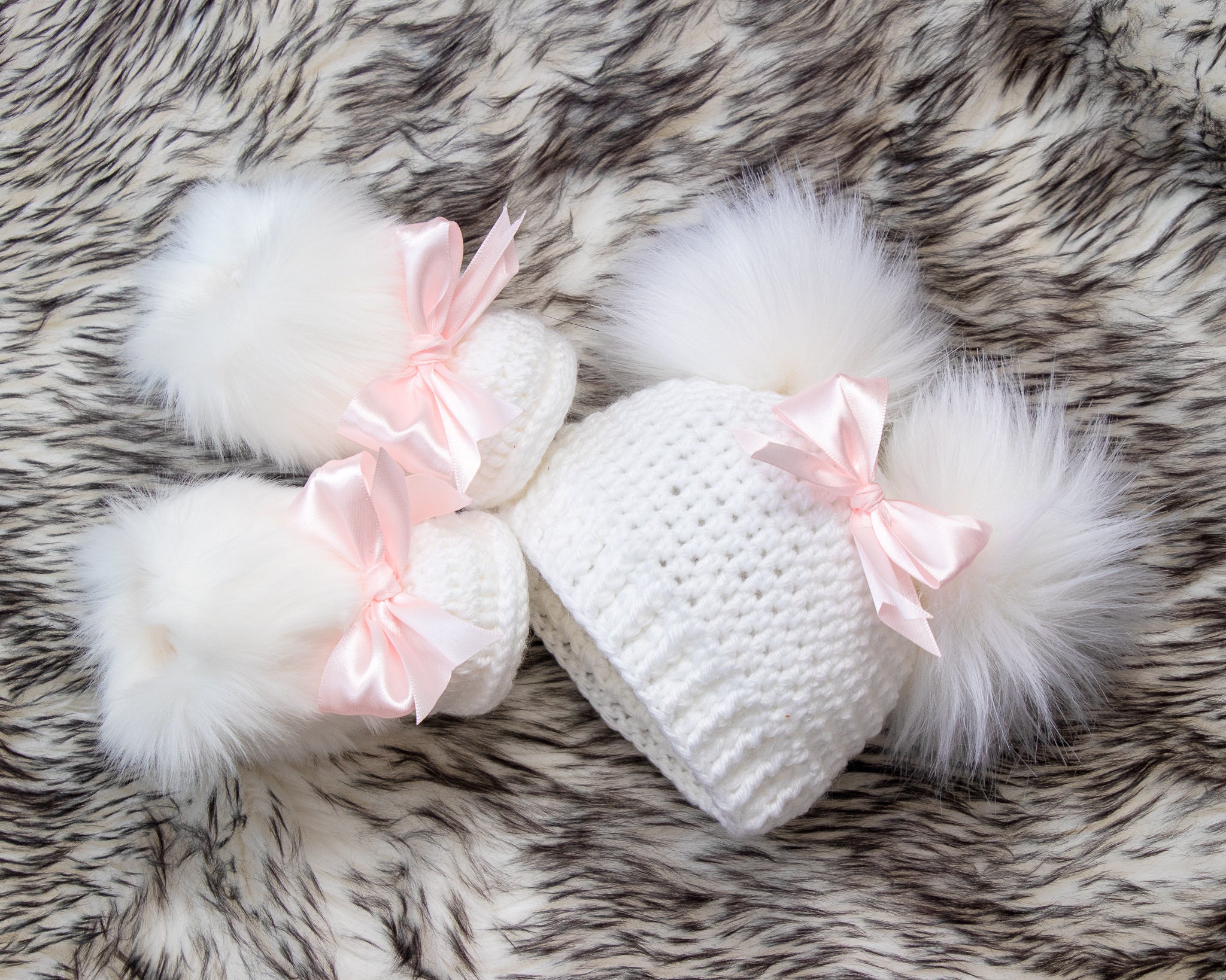 white pom pom hat baby