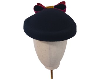 Black Avant-Garde felt luxury pillbox w/beautiful colorful velvet bow detail, raspberry, red, gold velvet ribbon, unique shap