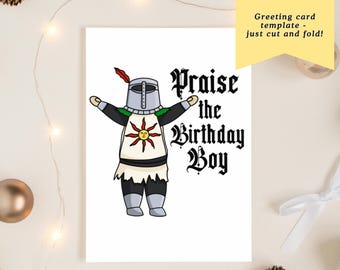 May include: A white greeting card featuring a cartoon knight with arms outstretched. The knight wears silver armor and a tunic with a sun emblem. The card reads "Praise the Birthday Boy" in gothic lettering. A yellow banner says "Instant Download".