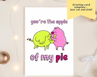 May include: A white greeting card with the text "you're the apple of my pie" in pink and black. The card features cartoon illustrations of a lime green creature and a pink pig kissing. A yellow banner reads "Instant Download".