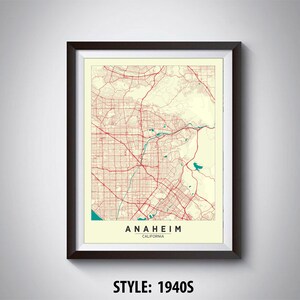 May include: A vintage style map print of Anaheim, California. The map is in red and white with a teal blue title and text. The style is 1940s.