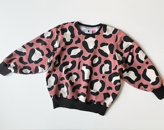 Pink sweater with big leopard spots. Winter sweater. Kids sweater. Lounge sweater. Children's jumper.