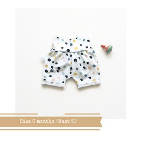 Last one: Slim fit shorts with colourful dots. Size NB. Comfy toddler or baby shorts. Organic cotton knit fabric.