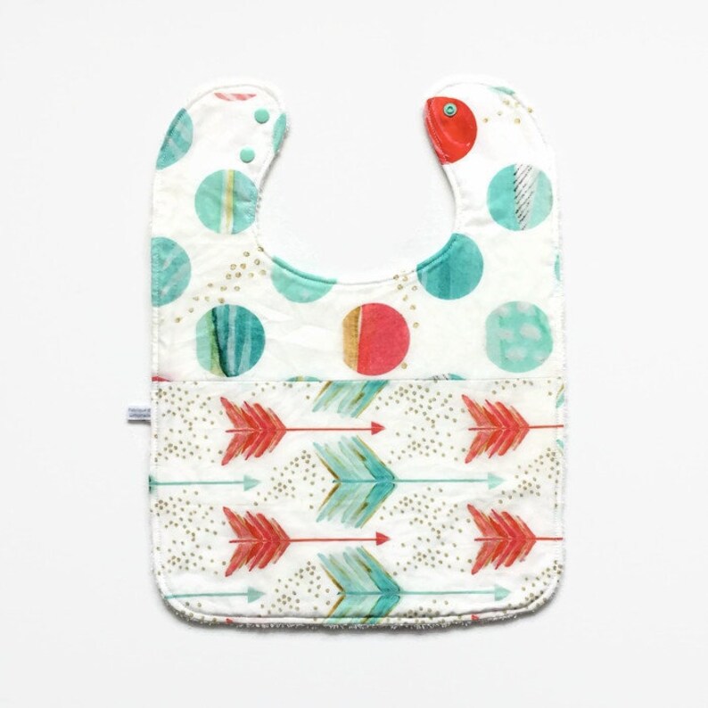 Large baby or toddler bib. White cotton with arrows and dots. Mint, coral, gold. White cotton terry back. image 1