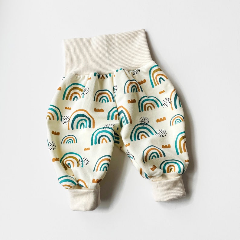 White baby pants with rainbows in green and brown. Baggy harem pants image 1