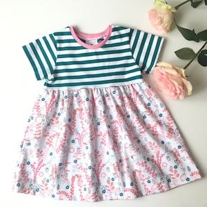 Girl&#39;s dress with stripes and flowers. Skater dress. Jersey fabric with teal stripes and pink flowers. Toddler dress, skater dress