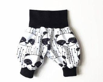 White bubble pants with pandas. Cotton. Comfy slouchy infant pants. Harem pants. Black fold over waistband and cuffs. Girl boy