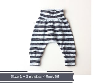 Baby or toddler harem pants with black and light grey stripes. Size 1 - 3 months