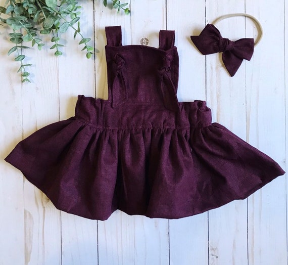 girls purple pinafore