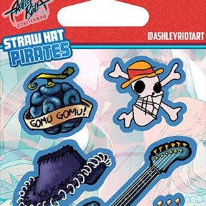 May include: A sticker sheet with vibrant designs from the "Straw Hat Pirates" anime. It features a skull with a straw hat, a shark-shaped guitar, and the text "Gomu Gomu!" on a blue background.
