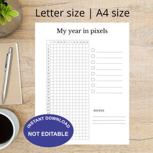 Puede incluir: Una hoja de planificación imprimible blanca con el texto "Letter size | A4 size" y "My year in pixels". La hoja tiene una cuadrícula para el seguimiento y una sección para notas. Un círculo azul con "INSTANT DOWNLOAD NOT EDITABLE" está en la parte inferior.
