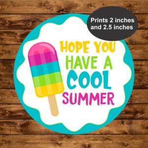 May include: A round, blue and white sticker with a colorful popsicle graphic and the text "Hope you have a cool summer". The sticker is designed to print at 2 inches and 2.5 inches.