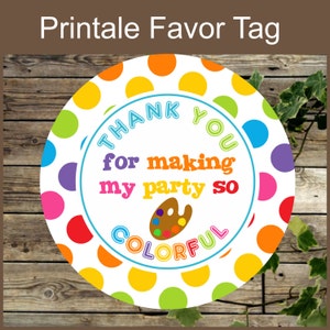 May include: Round favor tag with a white background and colorful polka dots. The tag says "Thank you for making my party so colorful" with a paint palette graphic.