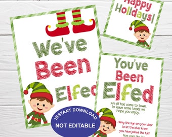 Op de afbeelding: Een set afdrukbare vakantieborden met elfenthema's. De borden bevatten teksten als "We've Been Elfed", "You've Been Elfed" en "Happy Holidays!" met elfenillustraties en een groen-rood kleurenschema.