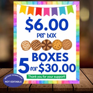 Puede incluir: Un cartel colorido con un borde de arcoíris y un fondo blanco. El cartel anuncia galletas Girl Scout con un precio de 6,00 € por caja y una oferta especial de 5 cajas por 30,00 €. El cartel también incluye una imagen de diferentes tipos de galletas Girl Scout y el texto "¡Gracias por su apoyo!"
