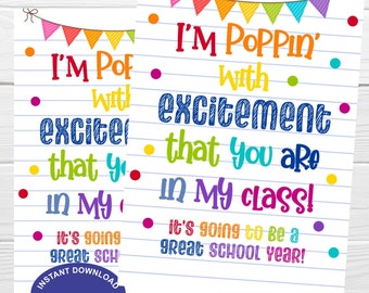 May include: A printable sign with a colorful banner at the top and the text "I'm Poppin' with excitement that you are in my class! It's going to be a great school year!" in a colorful, handwritten font.