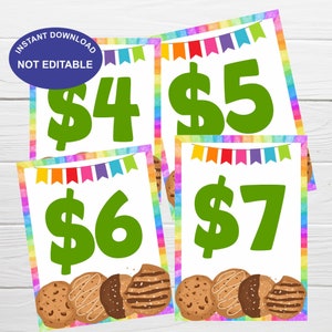 Puede incluir: Cuatro etiquetas de precios coloridas con diferentes precios para las galletas Girl Scout. Los precios son $ 4, $ 5, $ 6 y $ 7. Cada etiqueta tiene un borde de arcoíris y una fila de banderas coloridas en la parte superior. La parte inferior de cada etiqueta tiene una imagen de cuatro tipos diferentes de galletas Girl Scout.