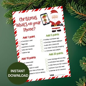 Puede incluir: Una hoja de juego con temática navideña titulada "Christmas What's on your Phone?" con un borde rojo y blanco. La hoja incluye desafíos basados en puntos y un gráfico de Papá Noel. También se ven las palabras "Descarga instantánea".