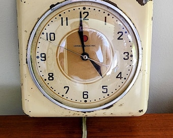 Vintage Mid Century Modern GE Avocado Electric Wall Clock Model