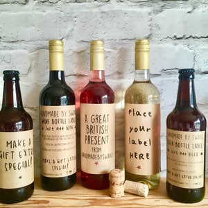 May include: Five bottles of wine and beer with personalized labels. The labels are brown with white text and include the text "Just add wine" and "Just add beer".