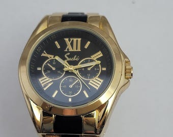 Vintage horloges Sachi goudzwart quartzhorloge met Romeinse wijzerplaat en sportstijl
