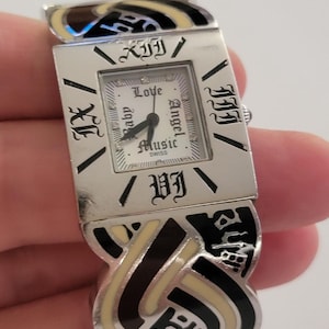 L.A.M.B. Womens Watch Love Angel Music White Dial Silver Enamel Bracelet Quartz image 1