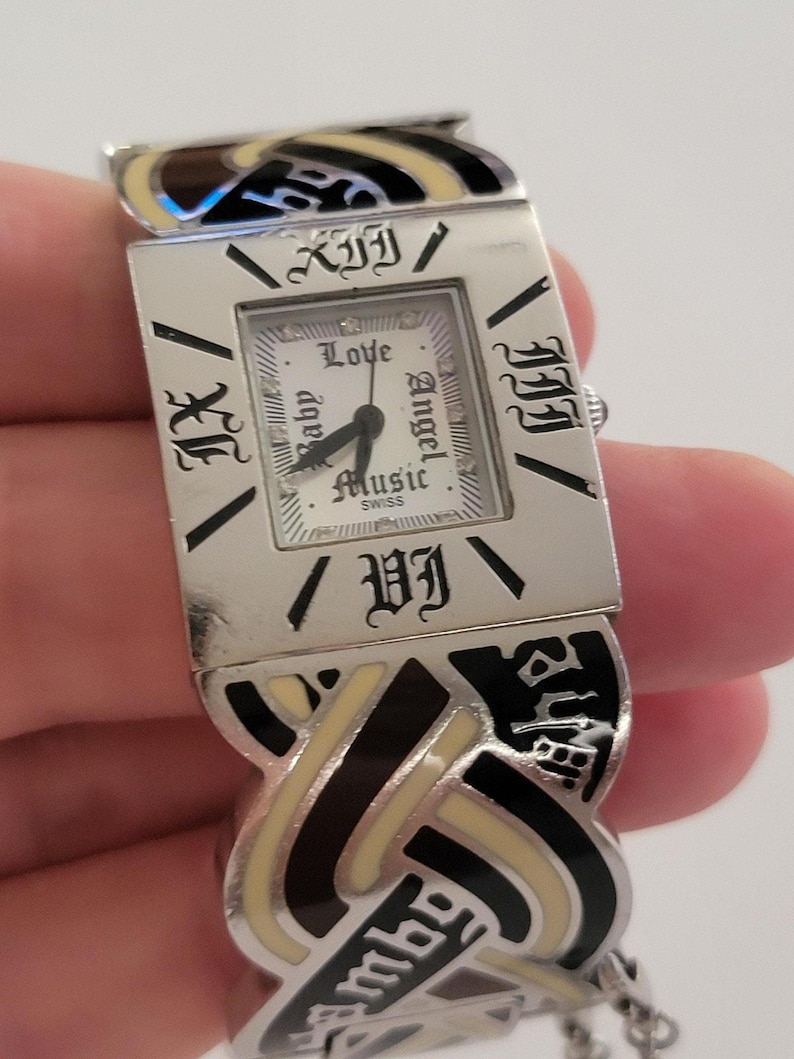 L.A.M.B. Womens Watch Love Angel Music White Dial Silver Enamel Bracelet Quartz image 1