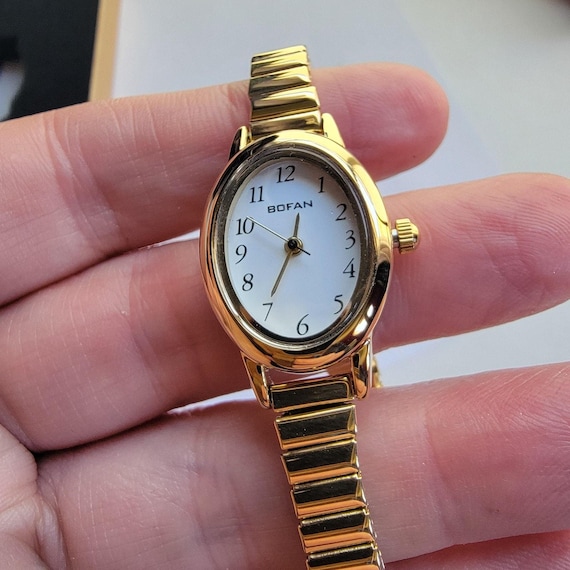 women's gold dress watch BOFAN Womens White Dial Tone Oval Expansion Bracelet Quartz style:modern
