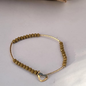 Vintage Perlenarmband goldfarbenes Herz Charm minimalist 1990s Schmuck