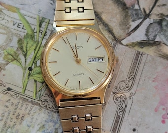 Elgin SWISS Quartz Ladies W/date Goldtone Stainless Steel Els48