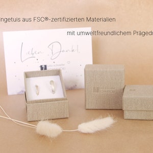 Trauring Etuis, beigefarben mit strukturiertem Canvas-Papier, FSC® zertifizierte Materialien mit umweltfreundlichem Prägedruck.