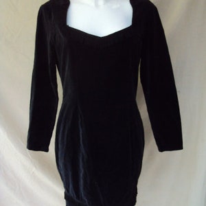 Western style black velvet dress with long sleeves and fringing size 12