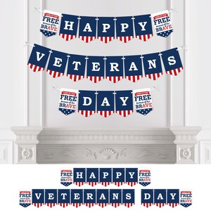 May include: A red, white, and blue banner with the words "Happy Veterans Day" and "Land of the Free because of the Brave" on each flag. The banner is perfect for decorating for Veterans Day.