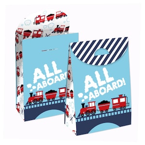 May include: Two blue gift bags with a train theme. The bags feature red trains, coal cars, and the words "ALL ABOARD!" in white. The bags have a handle and a flap with a navy and white striped pattern.